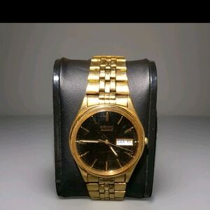 Seiko Gold and Black Men's Quartz Watch